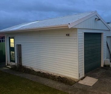 Family home with large deck in handy location! - Photo 2