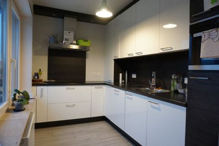 Appartement met kleine garageruimte/berging en 2 open staanplaatsen - Foto 4