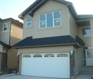 EXECUTIVE HOME 5 BED RMs, 3MASTER BDRMs 4Bath RMs IMMEDIATELY! | 121 Taralake Manor, Calgary - Photo 1