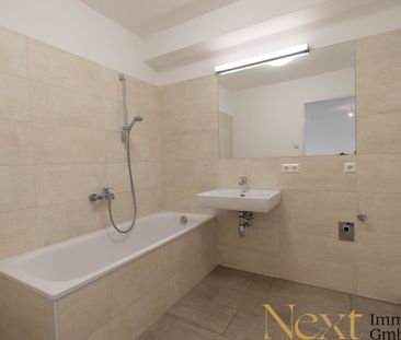 Lichtdurchflutete 2-Zimmer-Wohnung mit moderner Küche und Wintergar... - Photo 4