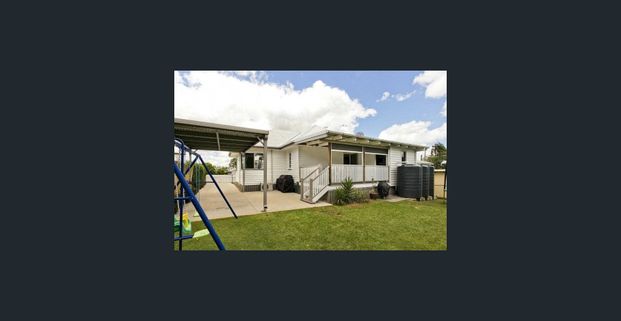 Post war home in great location - Photo 1