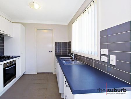 24 Eleanor Drive, Glenfield NSW 2167 - House For Rent | Domain - Photo 2