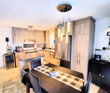 Logement à louer, proximité services, cour privée - Photo 1