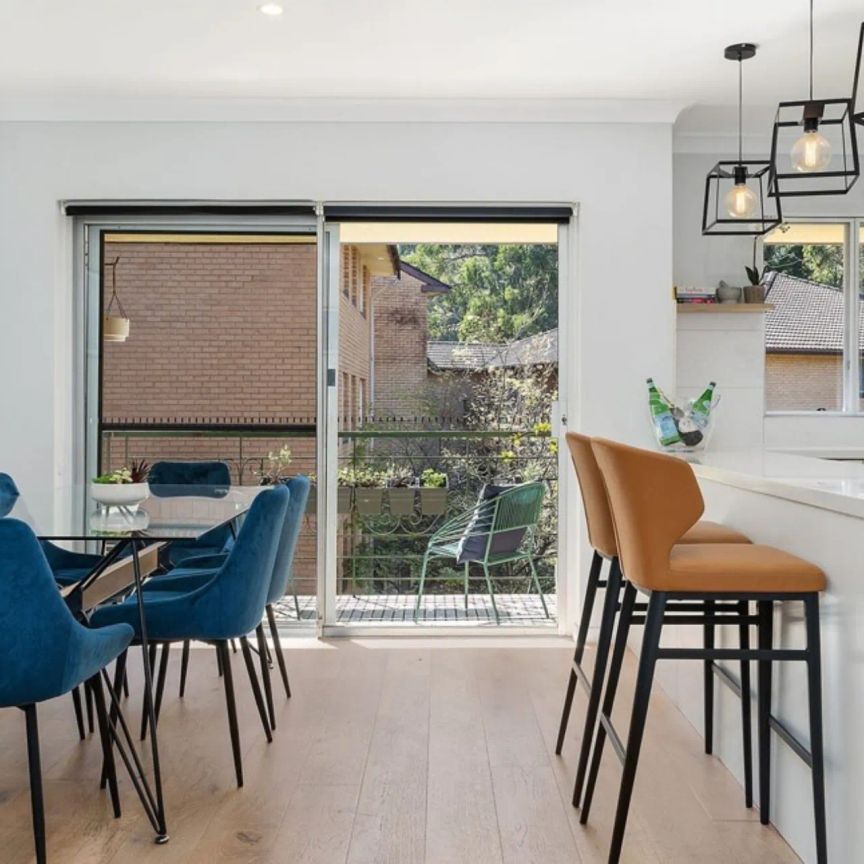 Stylishly Renovated Two Bedroom Apartment in Ultra-Convenient Location - Photo 1