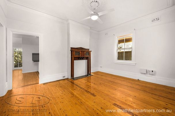Located in a peaceful tree-lined Street - Photo 1