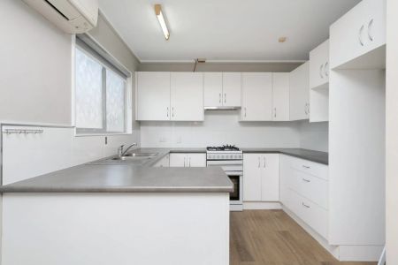 Spacious Dual-Level Home with Pool & Shed in Prime Location - Photo 4