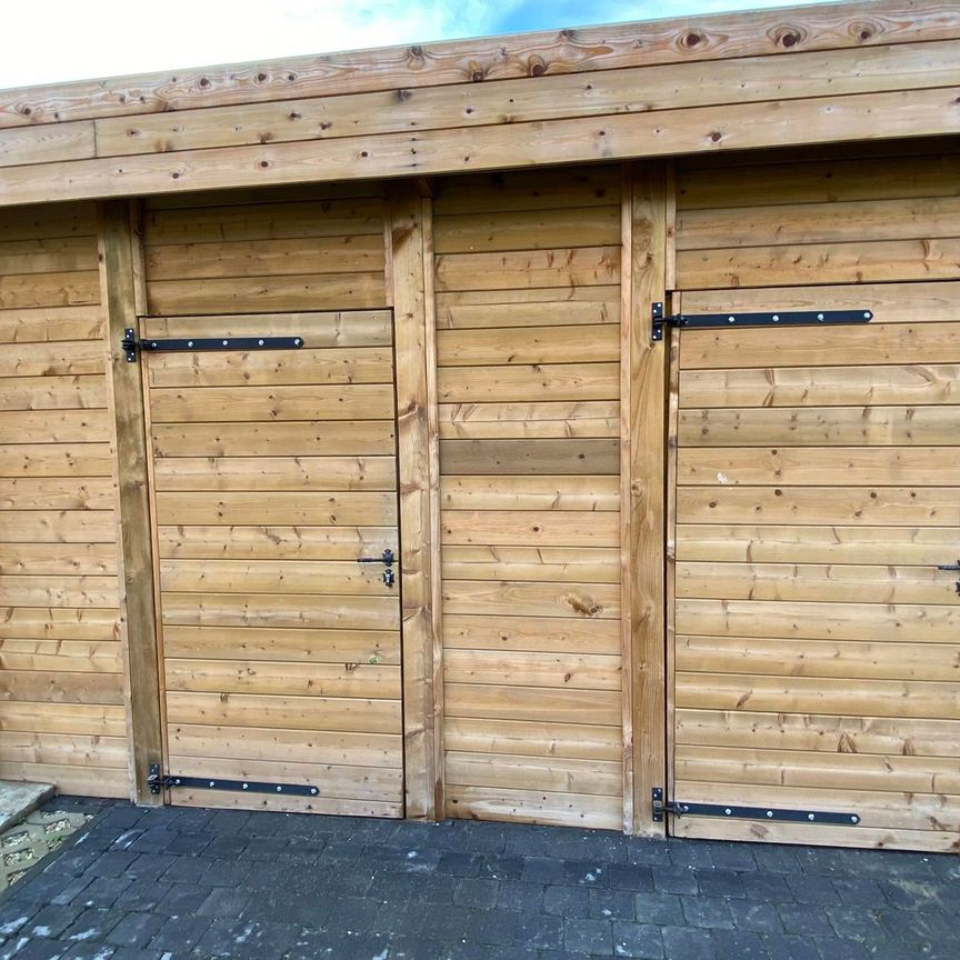 Gelijkvloers nieuwbouwappartement met terras en tuin - Photo 1