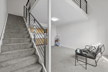 Dual-Level "Loft-Style" Apartment in Convenient Locale with Parking - Photo 3