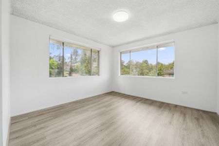 BRIGHT TOP FLOOR FULLY RENOVATED UNIT - Photo 5