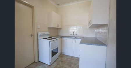 Two Bedroom Unit with Air Conditioner & Garage - Photo 3