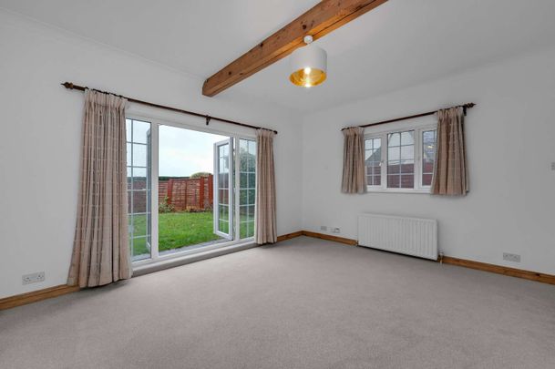 Located in an exclusive Guildford location and close to fantastic riding/walking country, a detached four bedroom property within a short drive from town centre and stations. - Photo 1