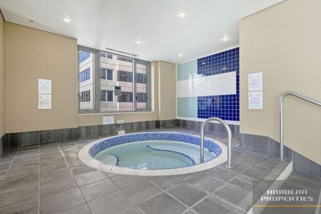 Freshly Renovated Two-Bedroom Apartment with City Views - Photo 2