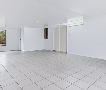 Back Property - Spacious Family Living with Solar, Water Tanks & Mo... - Photo 5