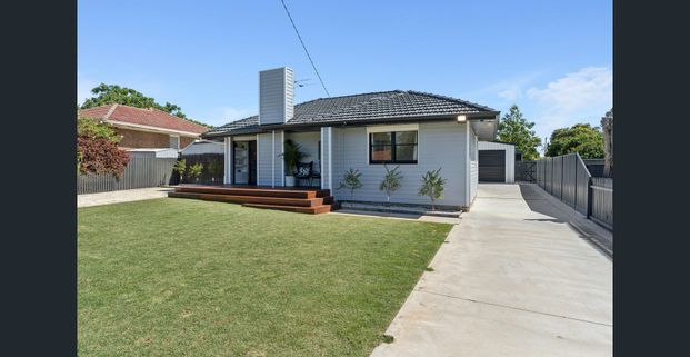 Stunning Fully Renovated Family Home – Dual Access Luxury Living - Photo 1