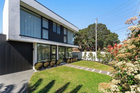 VERSATILE BAYSIDE BEAUTY WITH HUGE ENTERTAINING DECK - Photo 1