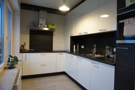 Appartement met kleine garageruimte/berging en 2 open staanplaatsen - Foto 3