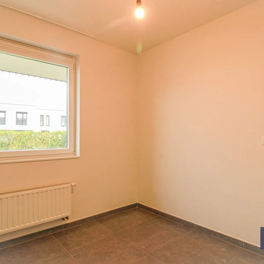 Gelijkvloers appartement met tuin en garage! - Photo 1