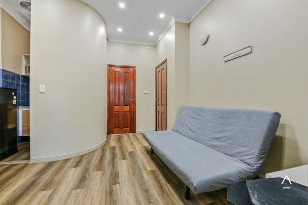 Furnished 2-Bedroom Apartment in the Heart of Newtown - Photo 1