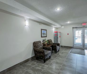 Spacious 2 Bed, 2.5 Bath Condo In Shawnessy | Fireplace, Balcony & ... - Photo 5