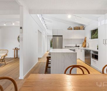 STYLISHLY RENOVATED COASTAL ABODE - Photo 6