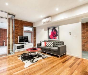 Industrial-Style Warehouse Living with Private Rooftop Terrace - Photo 1