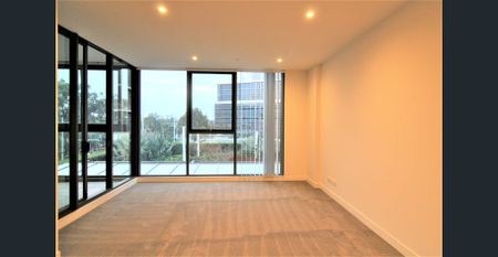 SPACIOUS 2 BEDROOMS WITH A WINTERGARDEN WITHIN 'CENTRALE' NORTH RYDE - Photo 2