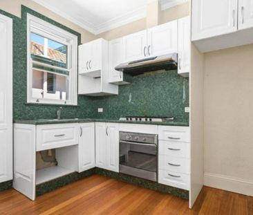 Vintage Charm Meets Modern Comfort in Windsor! - Photo 1