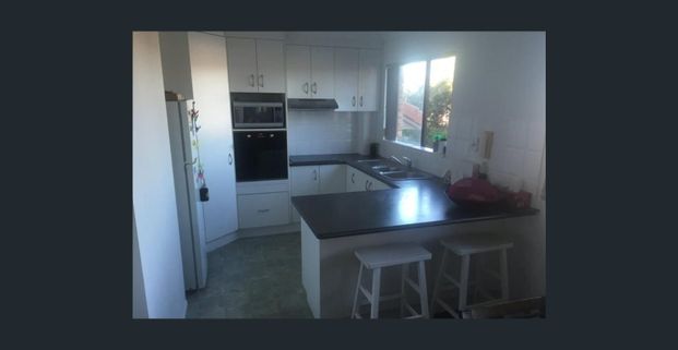 Bright 3-Bedroom Unit with River Views - Photo 1