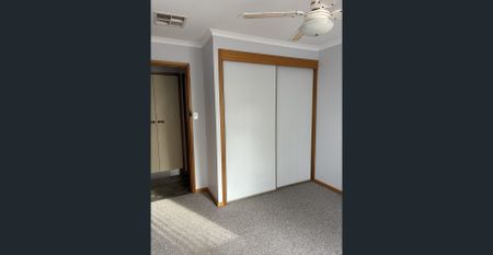 Neatly Maintained Family Home with Semi Open Plan Living and Outdoor Entertaining - Photo 4