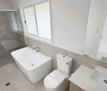 Spacious 4-Bedroom, 2-Bathroom House - Photo 1