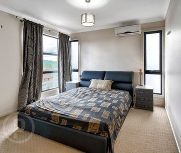 Modern Sophistication Meets Low-Maintenance Living - Photo 3