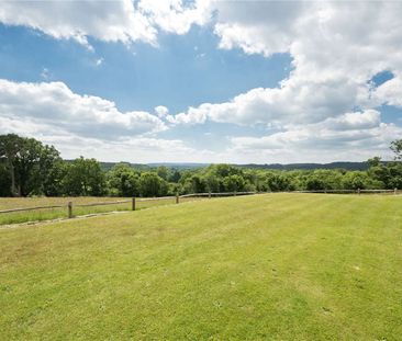 An extensively refurbished five bedroom country house with an indoo... - Photo 3