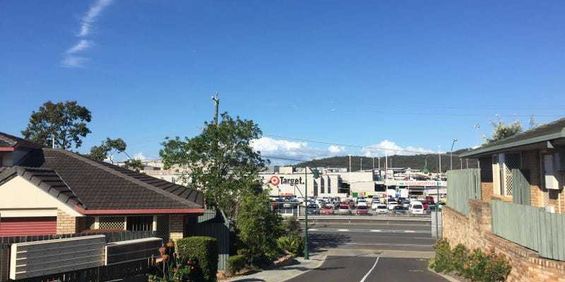 This comfortable 2-bedroom townhouse is in a perfect location - Photo 3