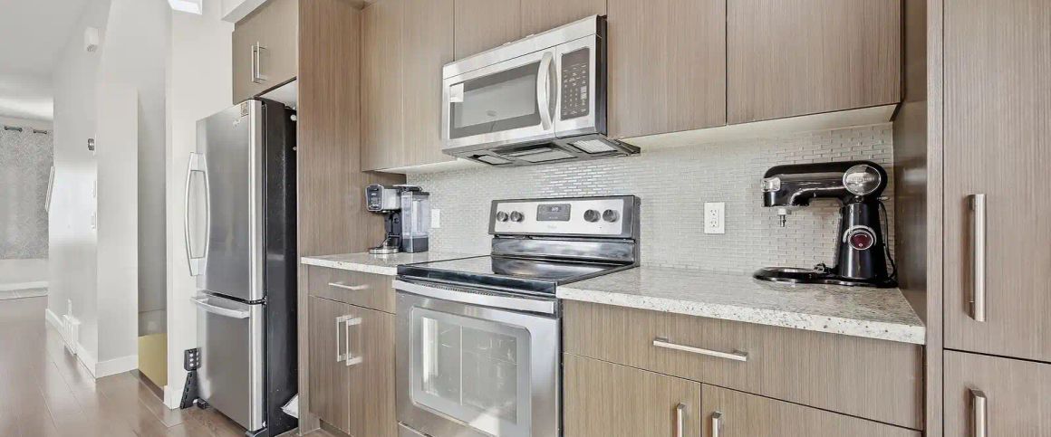 3 Bedroom Corner unit Townhome Near Ted Harrison School — 3 Bedrooms+ Den Townhouse - Photo 1