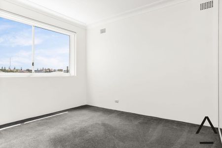 BEACHSIDE LIVING AT ITS BEST! - Photo 2