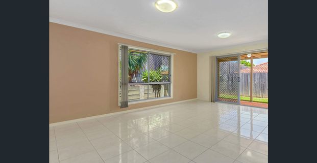 Bright 4-Bedroom Home Close to Transport and Amenities - Photo 1