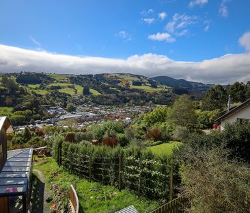 Modern, Sunny 4-Bedroom Home with Stunning Views! - Photo 1