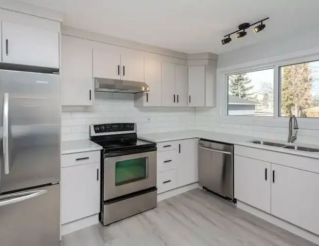 Modern 3 Bed 1.5 Bath Suite | 7424 41 Avenue Northwest, Edmonton - Photo 1