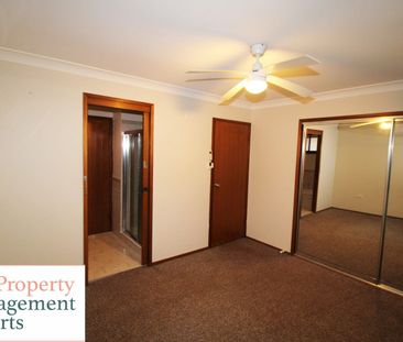 Charming 3-Bedroom Home with Spacious Living and Family-Friendly Fe... - Photo 1