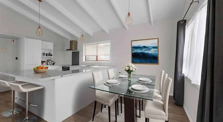 Three-Bedroom Home with Modern Open-Plan Living - Photo 4