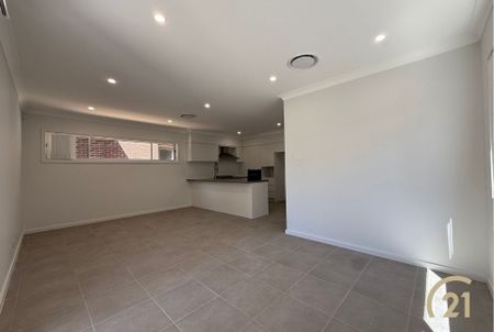 Brand New 4 Bedroom Home, Located in Austral! - Photo 2