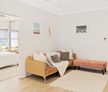 Sunny Beachside Apartment in Prime Location - Photo 1