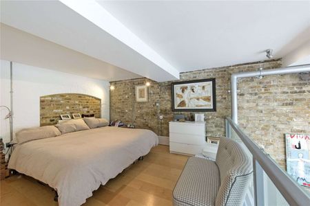 A beautifully designed two bedroom loft style apartment set within this stylish converted Victorian school. - Photo 4