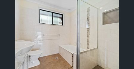 Charming family home with large shed - Photo 4