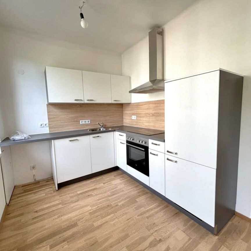 Perfekt aufgeteilte 2-Raum-Wohnung mit möblierter Küche in idealer Lage! - Foto 1