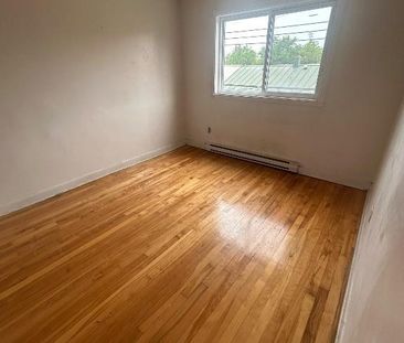 Haut duplex 5 1/2 a anjou - Photo 2