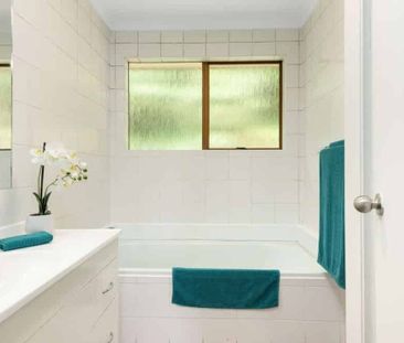 Elevated Three-Bedroom Home - Photo 3