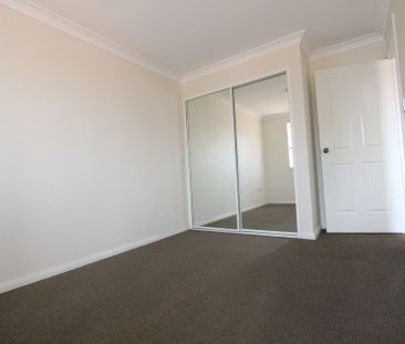 Immaculate 3 Bedroom Duplex in Quiet Location - Photo 2