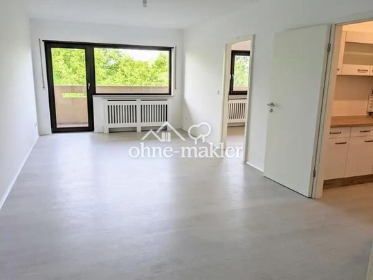 Exklusive 2,5-Zimmerwohnung mit herrlichem Blick ins Grüne mit TG-Stellplatz - Photo 1