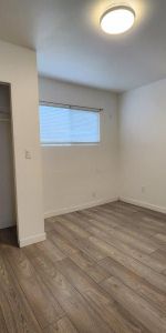 One Bedroom Ground Level Suite Including Utilities and One Parking Space - Photo 3